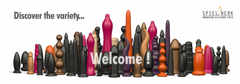 dildo spiel Red Silicone Anal Plug, Sex Toy, on a Black Background in the Shade.  Contrast Photo of Anal Toys, Erotic Toys Stock Image main image 0